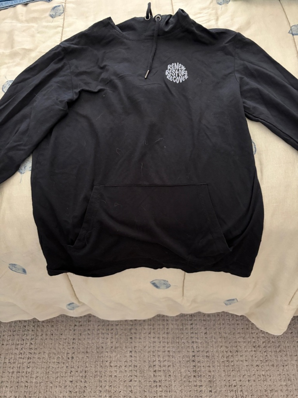 Black Pullover Hoodie with Small Chest Graphic